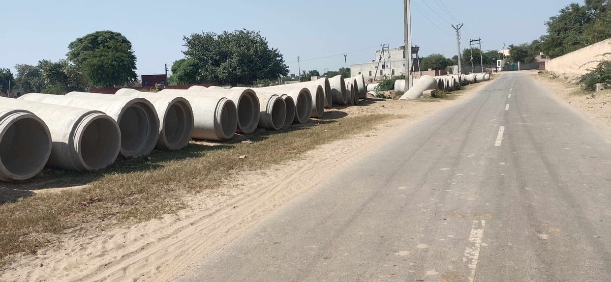 The work of laying pipeline for drainage is stuck in limbo.