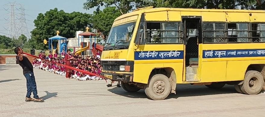 Showed strength by pulling school bus with teeth