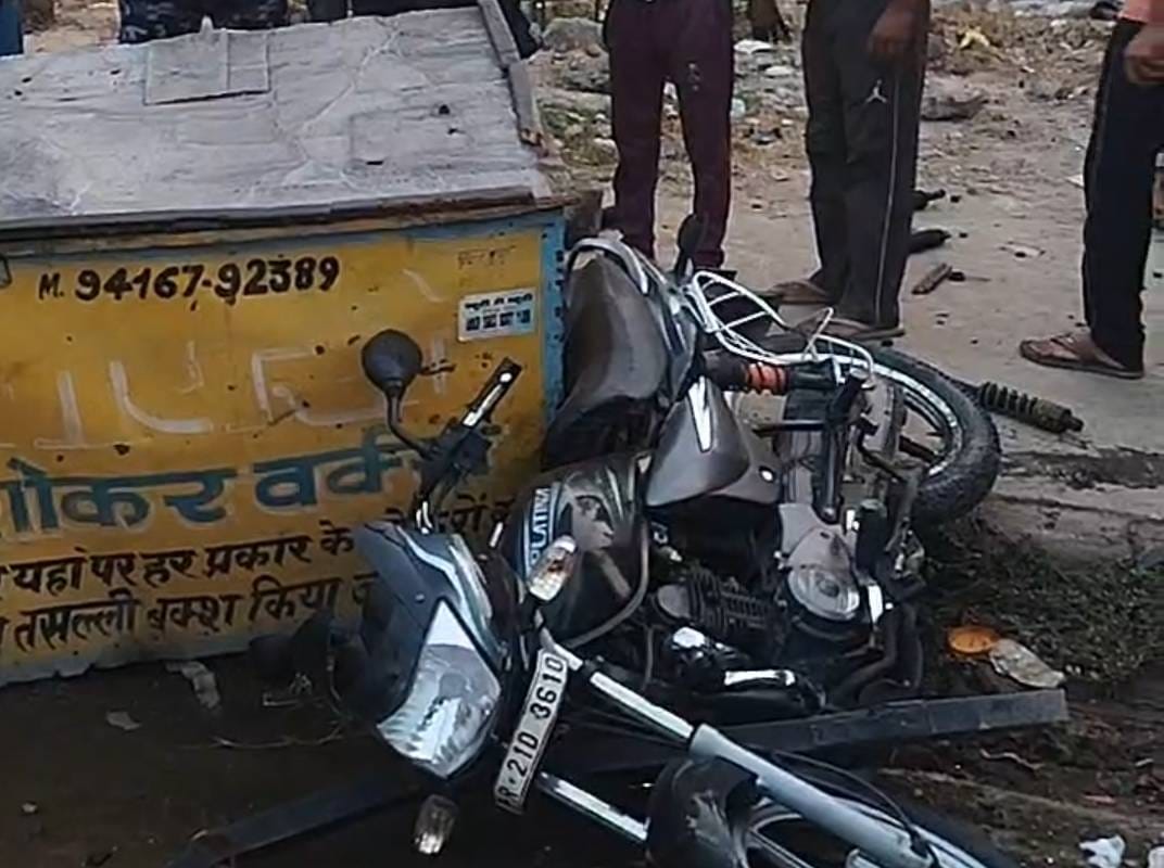 Scorpio driver hits bike in market, also drags shop rack