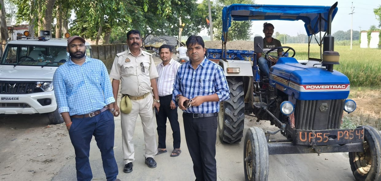 Two tractor-trolleys involved in illegal soil mining caught