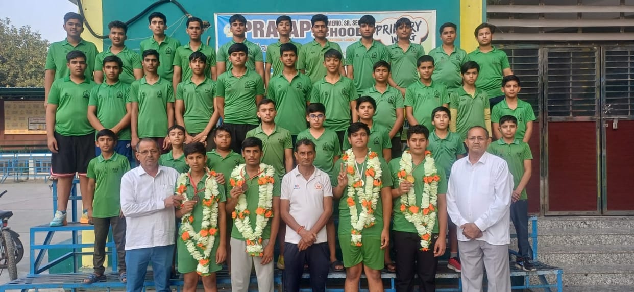 Medal winners welcomed in school
