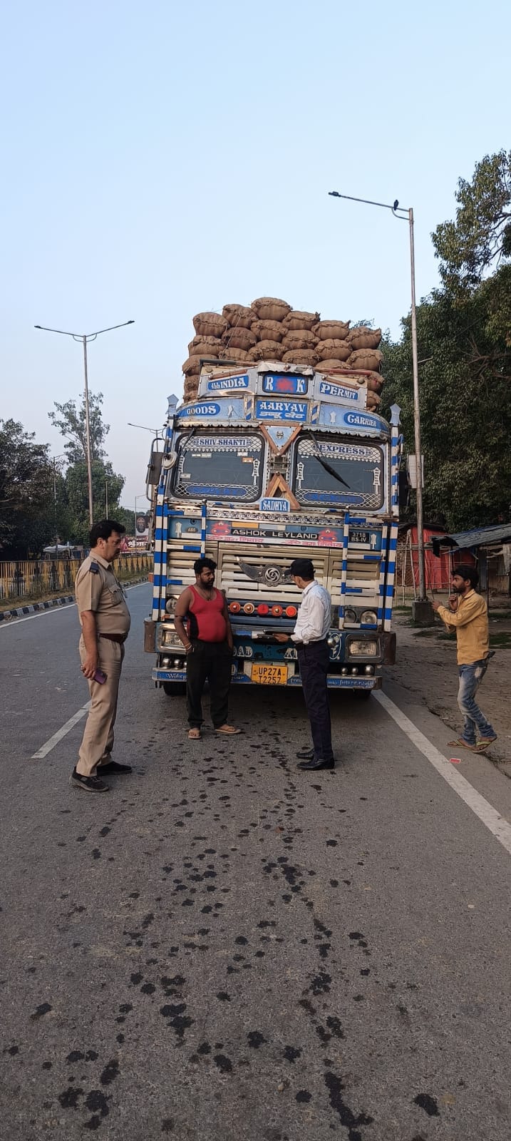 Two trucks carrying more goods than their capacity were fined, two buses were also seized