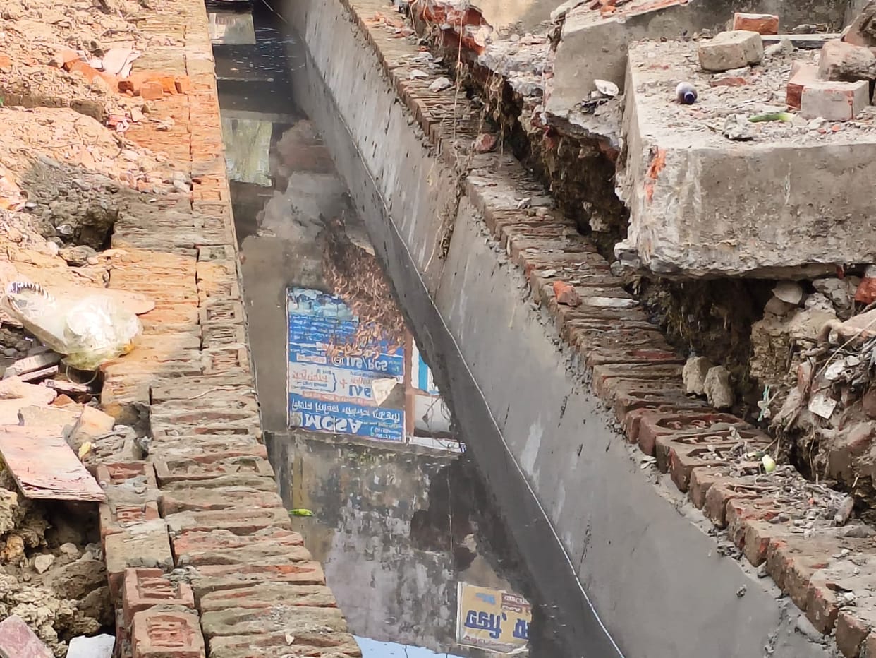 Old bricks are used in drain construction and plaster is being used to hide theft.