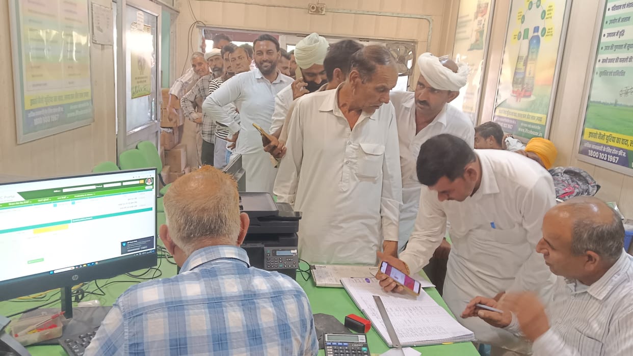 After fertilizer, there is a queue at the center for wheat seeds
