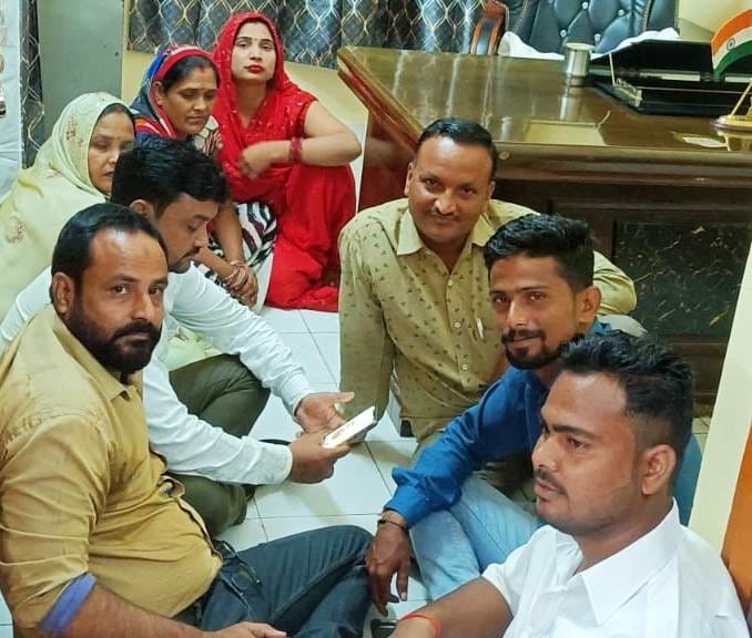 Members angry over cancellation of meeting staged a sit-in