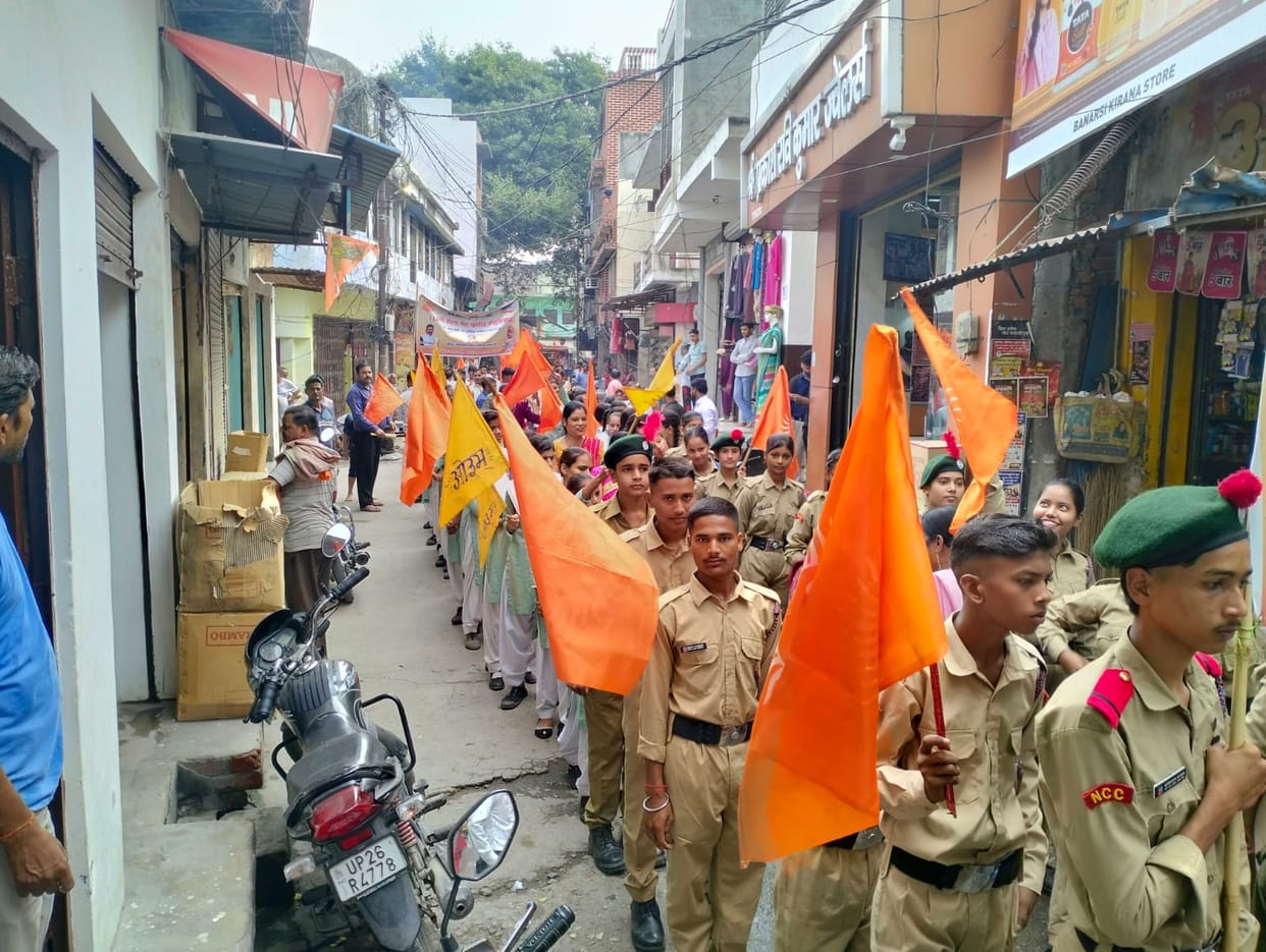 A procession was taken out in Puranpur under the Mela Veda Prachar Utsav