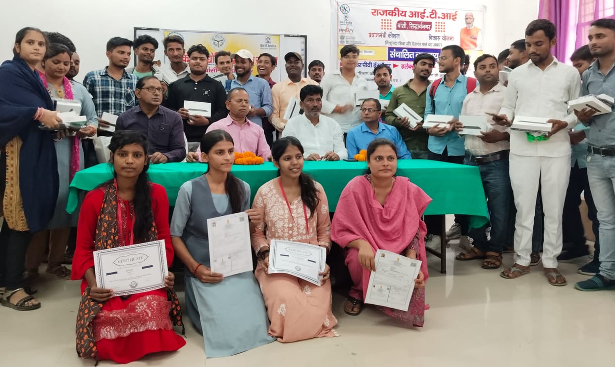 Three students were given medals and other students were given tablets.