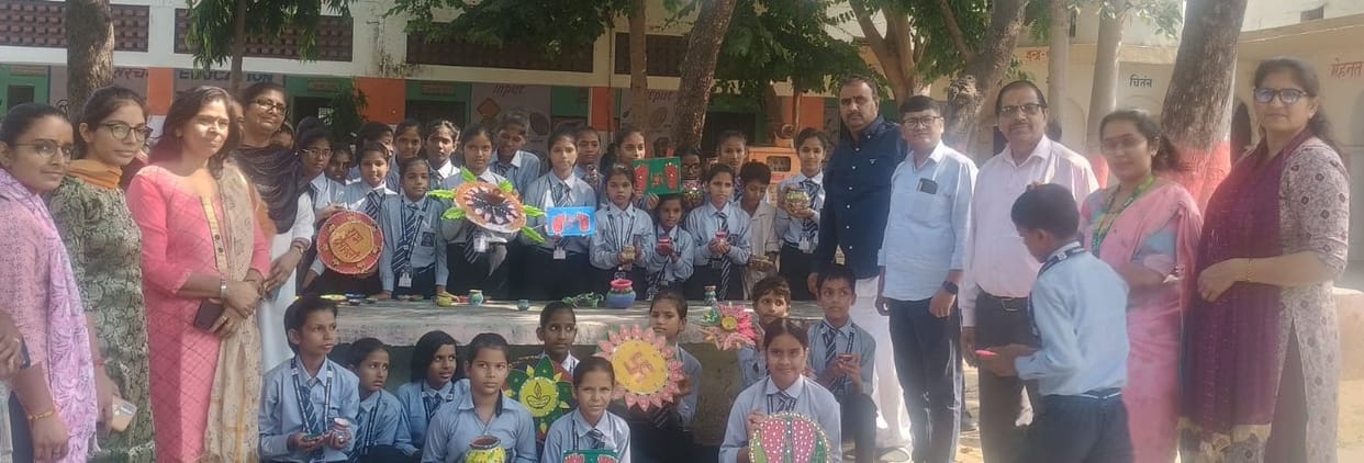 Riya tops in Rangoli competition, Mahi comes second