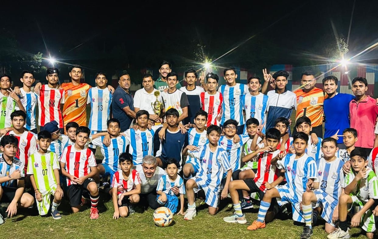Welcomed the winning team of football competition