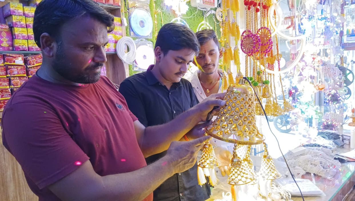 Markets covered with idols of Lakshmi Ganesh, lamps and electric lights