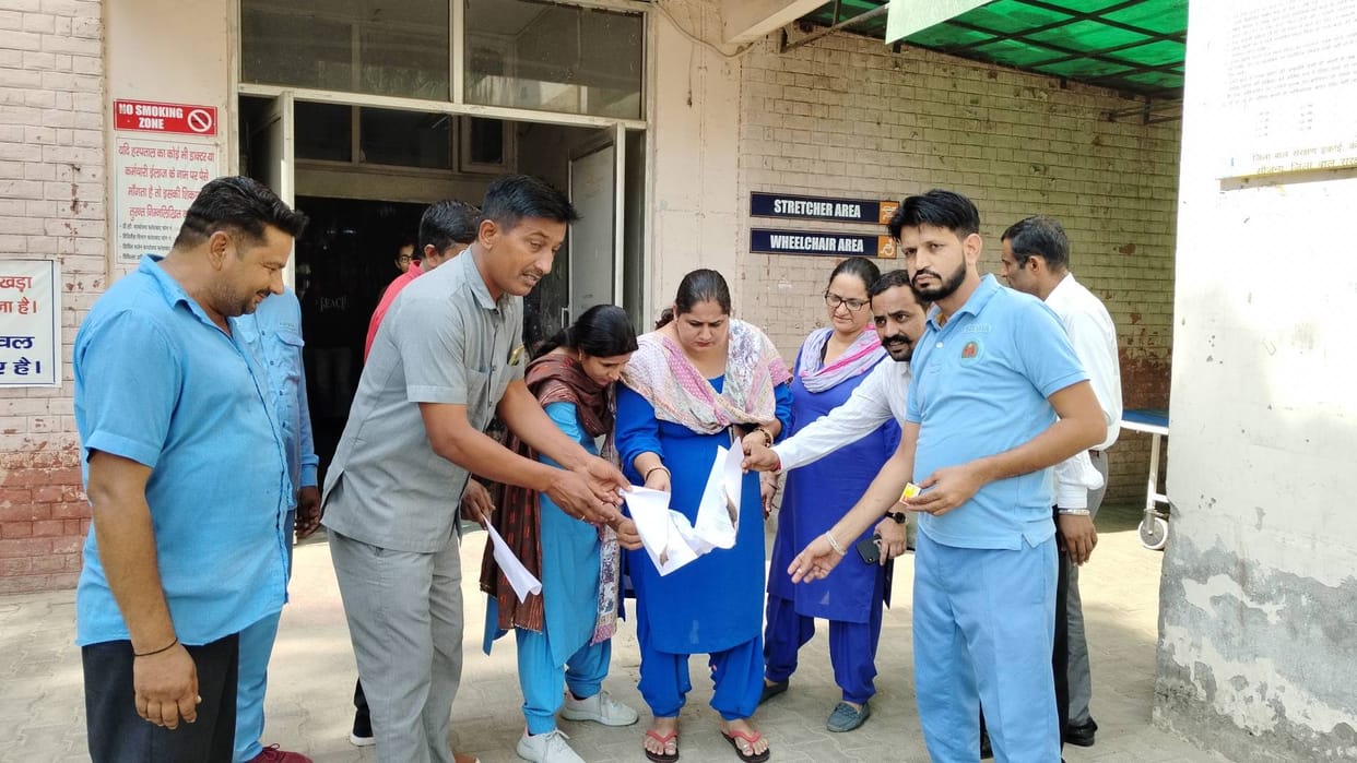 NHM workers burnt copies first, celebrated after 30 minutes
