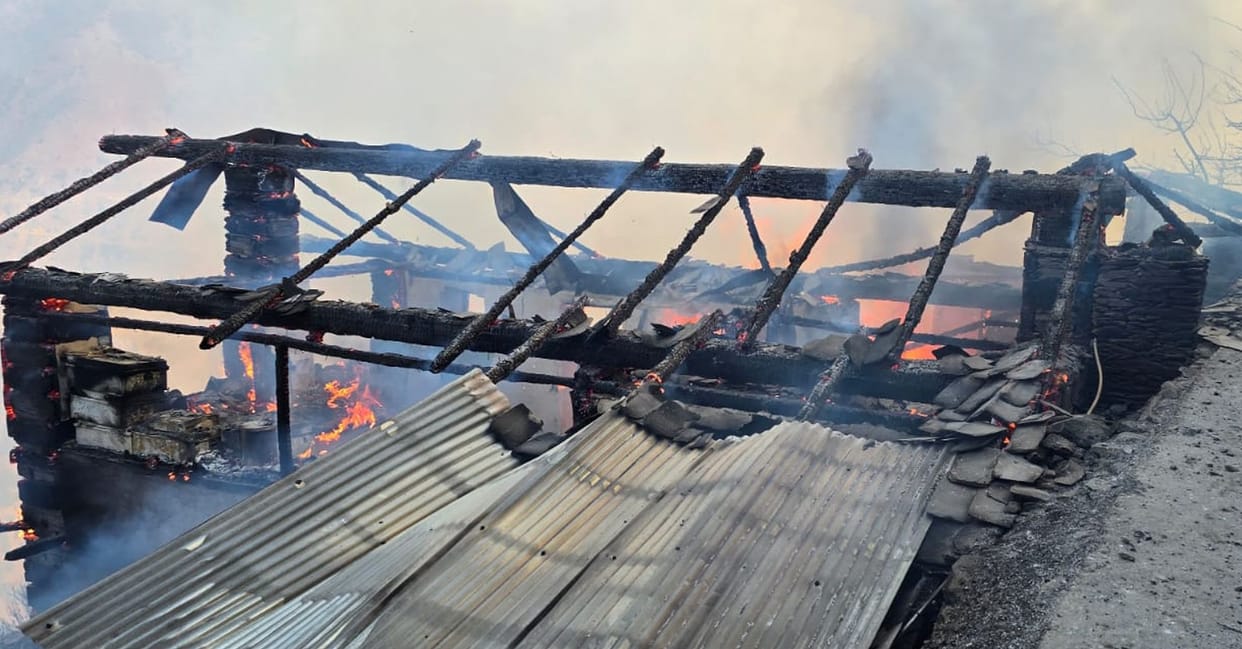Two houses and eight cow sheds of three brothers were burnt to ashes, a dozen sheep and goats were scorched.