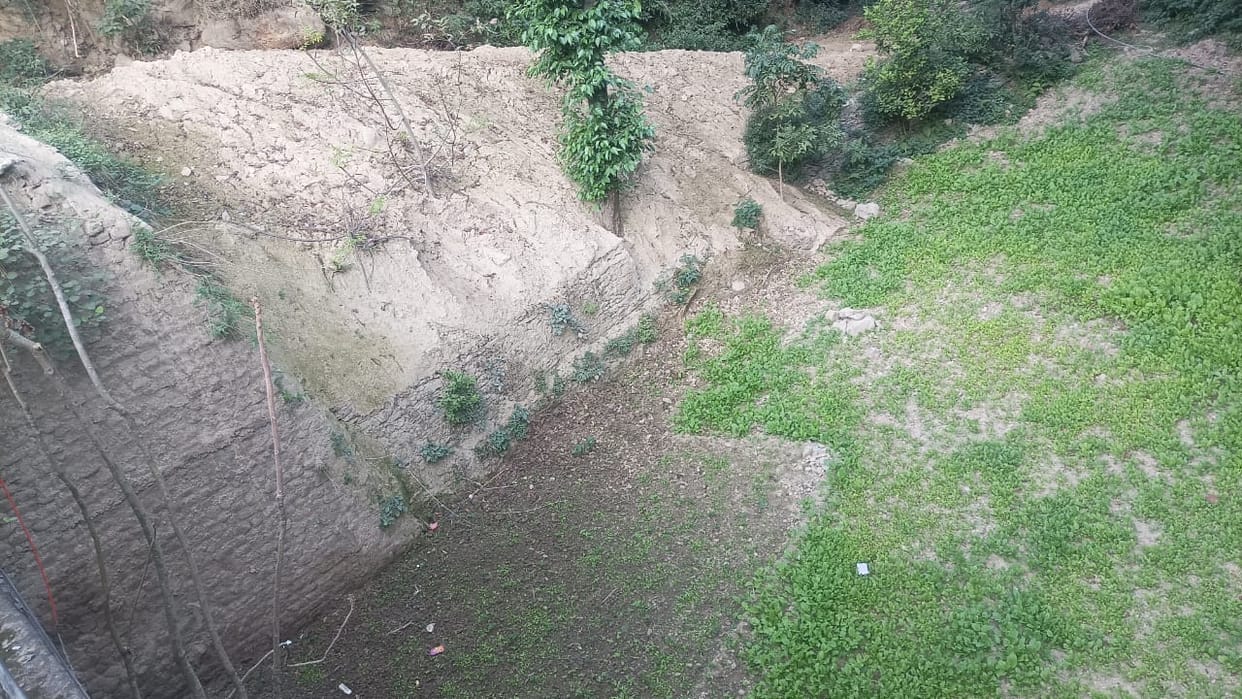 Panihar built with Chaminu bridge buried in a pile of soil