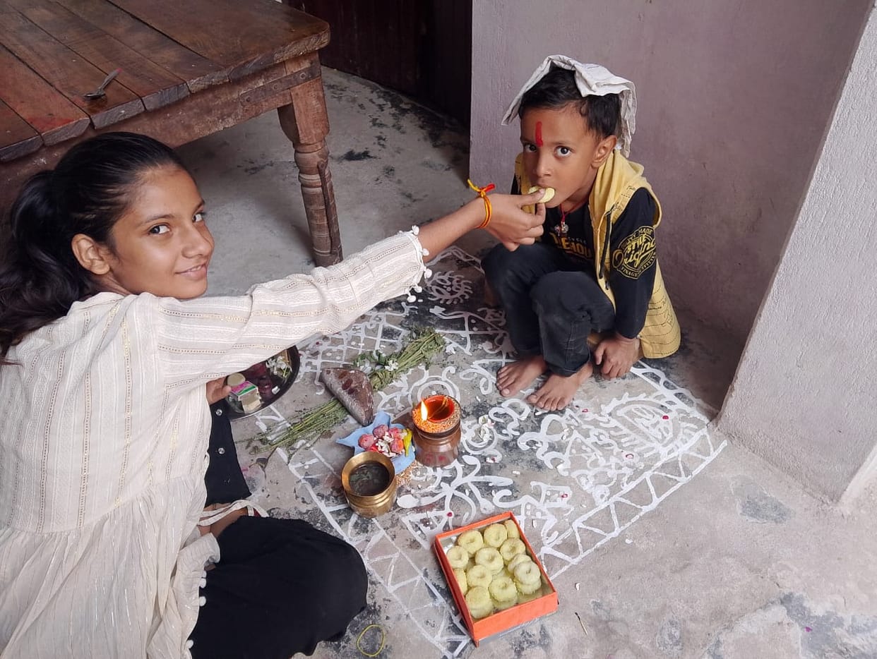 Sisters applied Tilak on their brothers and prayed to God for their long life