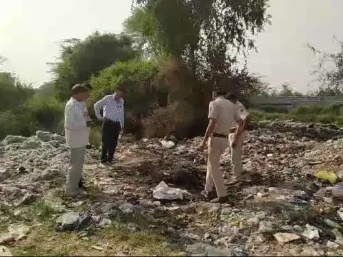 Burnt body of youth found in garbage heap, suspicion of murder