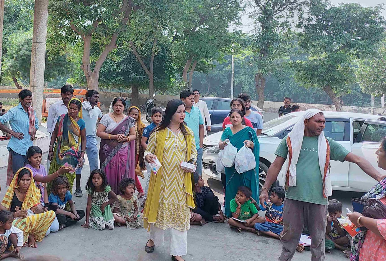 City residents engaged in helping homeless people after their slums got burnt due to sparks of firecrackers.