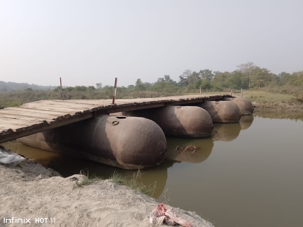 A pontoon bridge is ready on the small stream of Sharda river