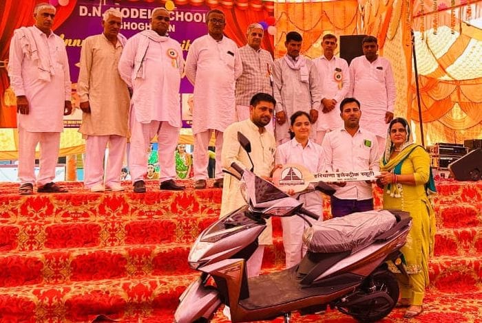 Electric scooter given to five topper girls of class 10th and 12th