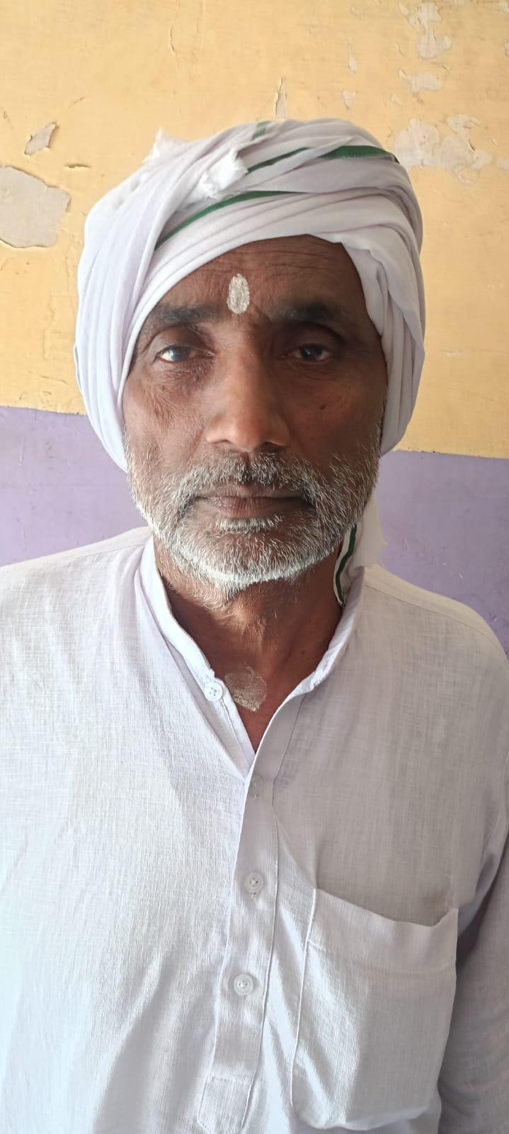 An old man who is dead on paper is pleading to be registered as alive
