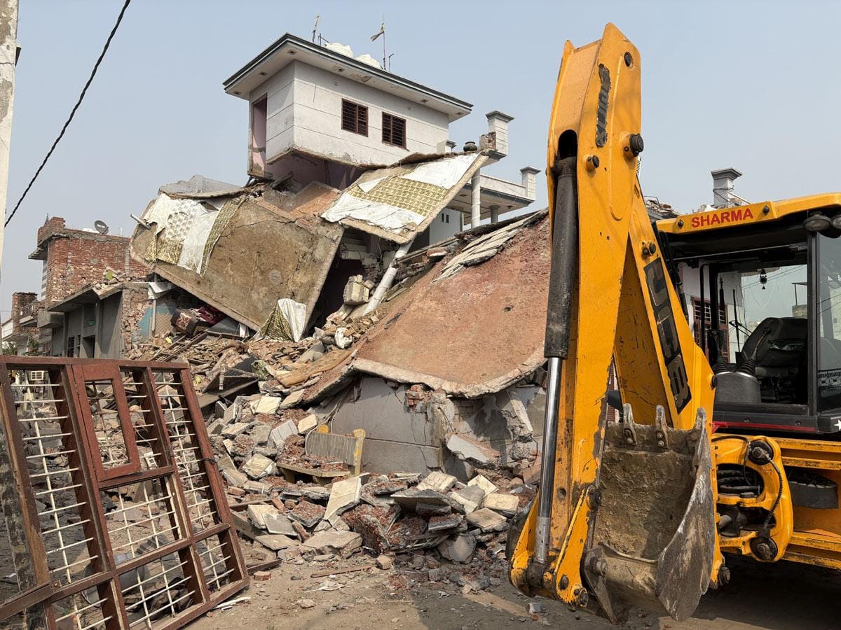 Damaged house demolished under the supervision of administration