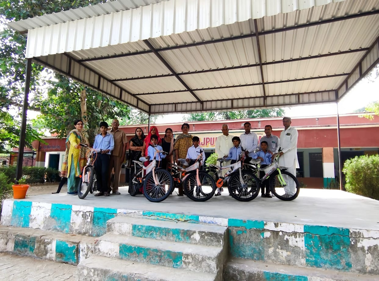 Gave bicycles to students coming from far away places