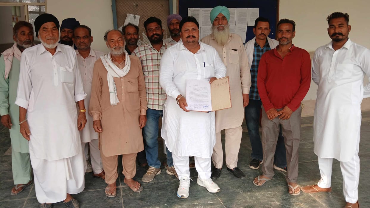 Two youths threatened to kill the Sarpanch if he got rid of the encroachment on the cemetery land.