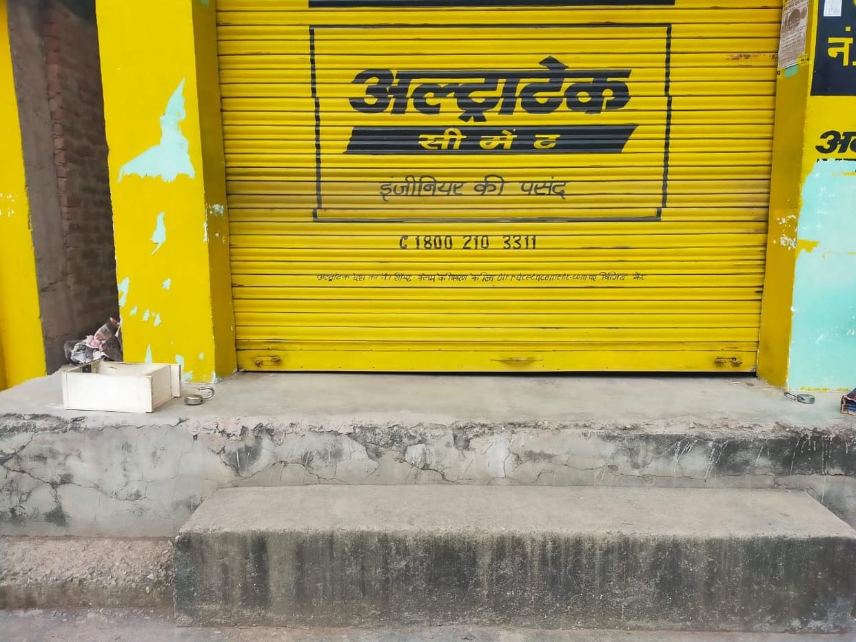 Breaking the locks of the shop and stealing cash and goods
