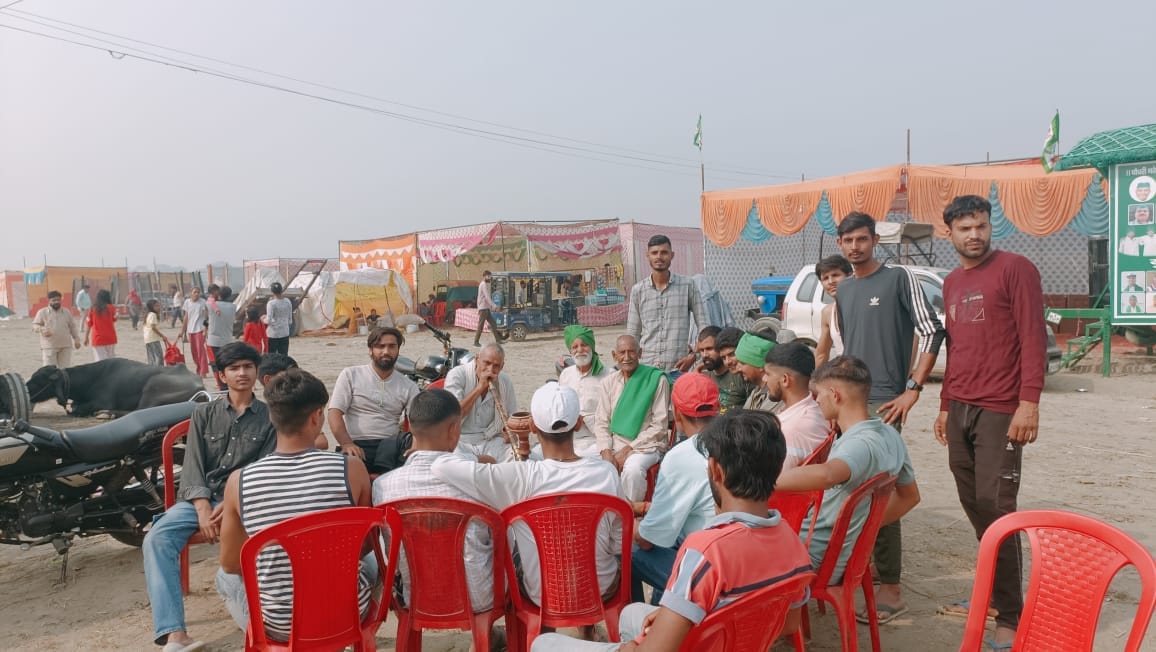 The fair was bustling, a city of tents settled in the sands of Ganga.