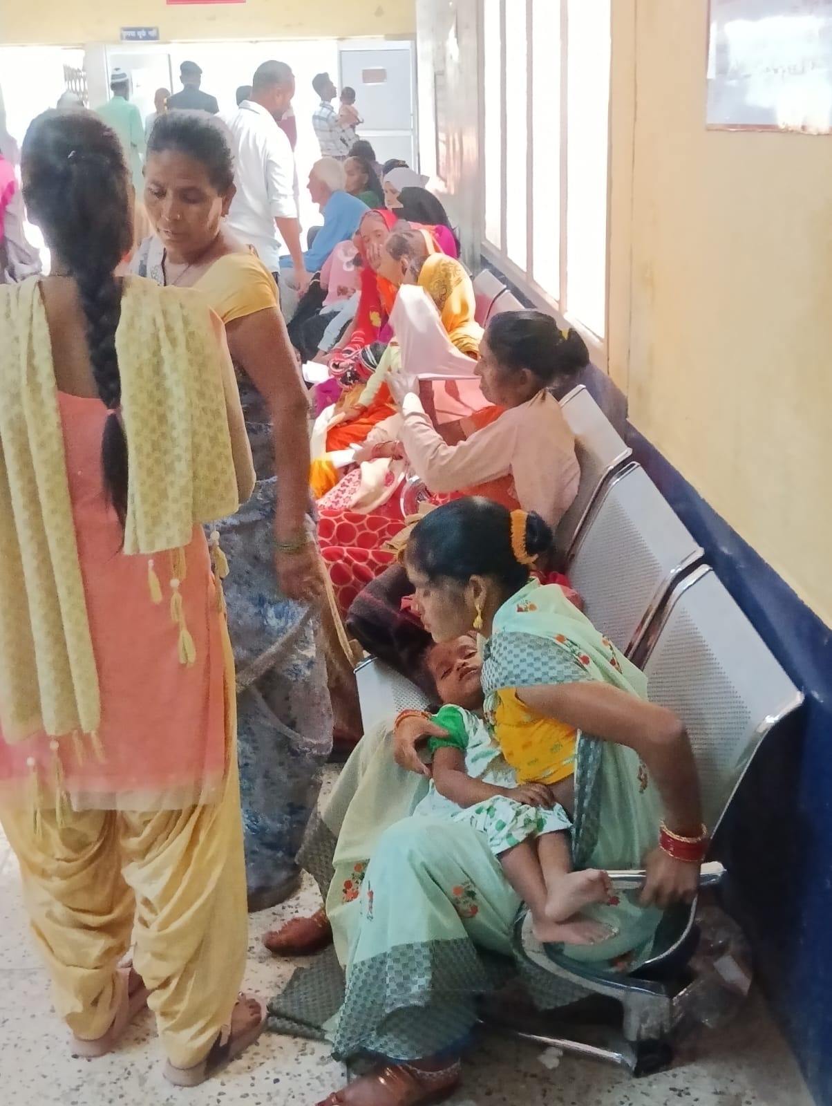 Patients forced to sit on broken benches, rushing for reports
