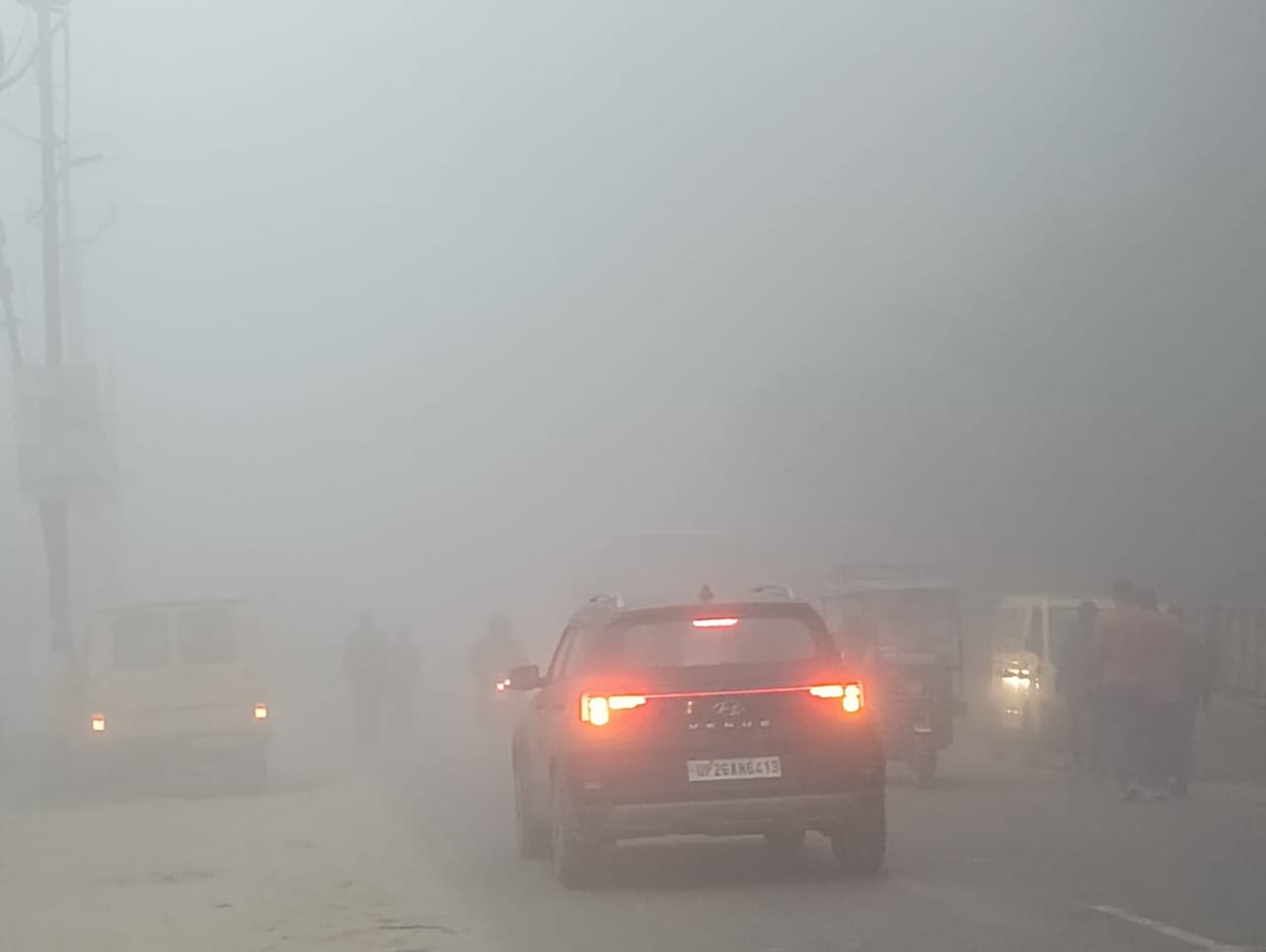 The district was wrapped in a blanket of fog...vehicles came out in the morning with headlights on