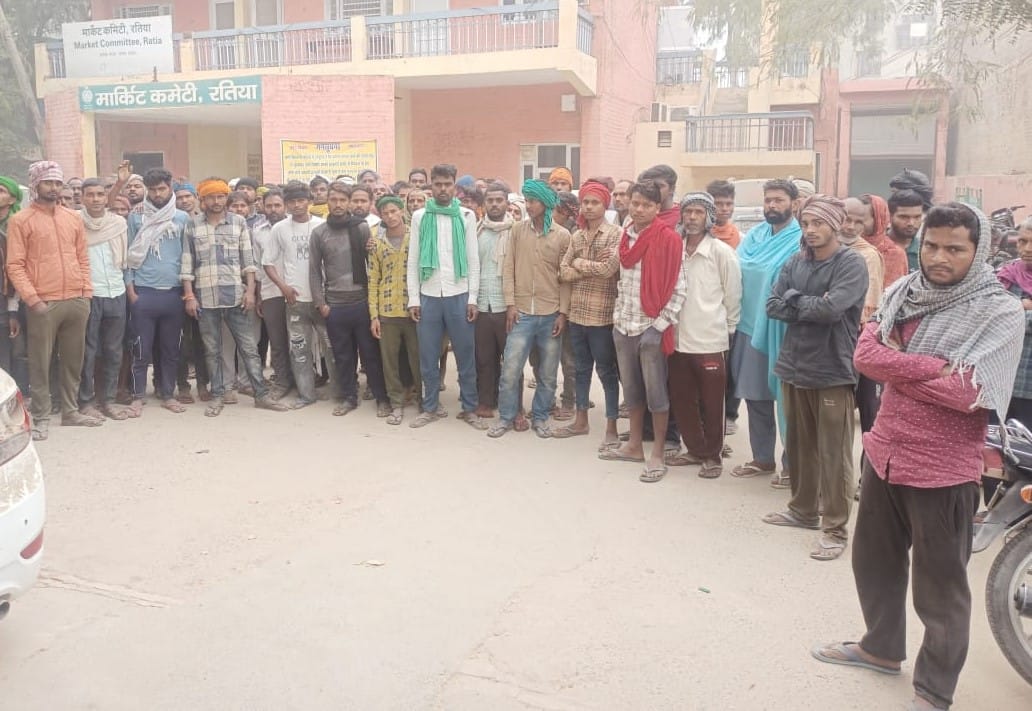 A laborer carrying a fan for threshing paddy died after being hit by a tractor-trolley.