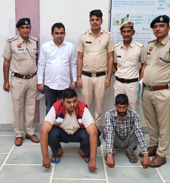 Two arrested including servant accused of shop theft