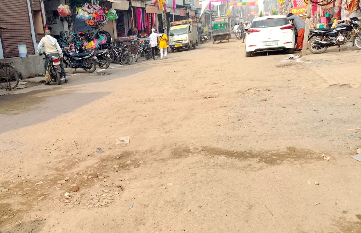 Making the road difficult by putting blocks and soil in the potholes of the railway road.