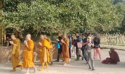 Followers prayed after circumambulating Anand Bodhi