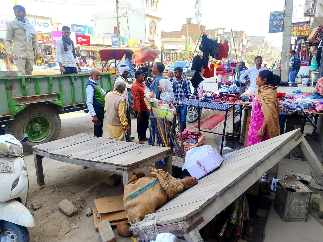 Municipality confiscated goods kept on the road amid protest from shopkeepers
