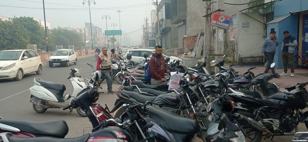 Vehicles parked on the side of the road and highway are inviting accidents.