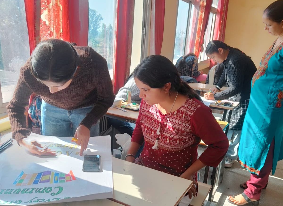 Nitika and Rajni stood first in poster making