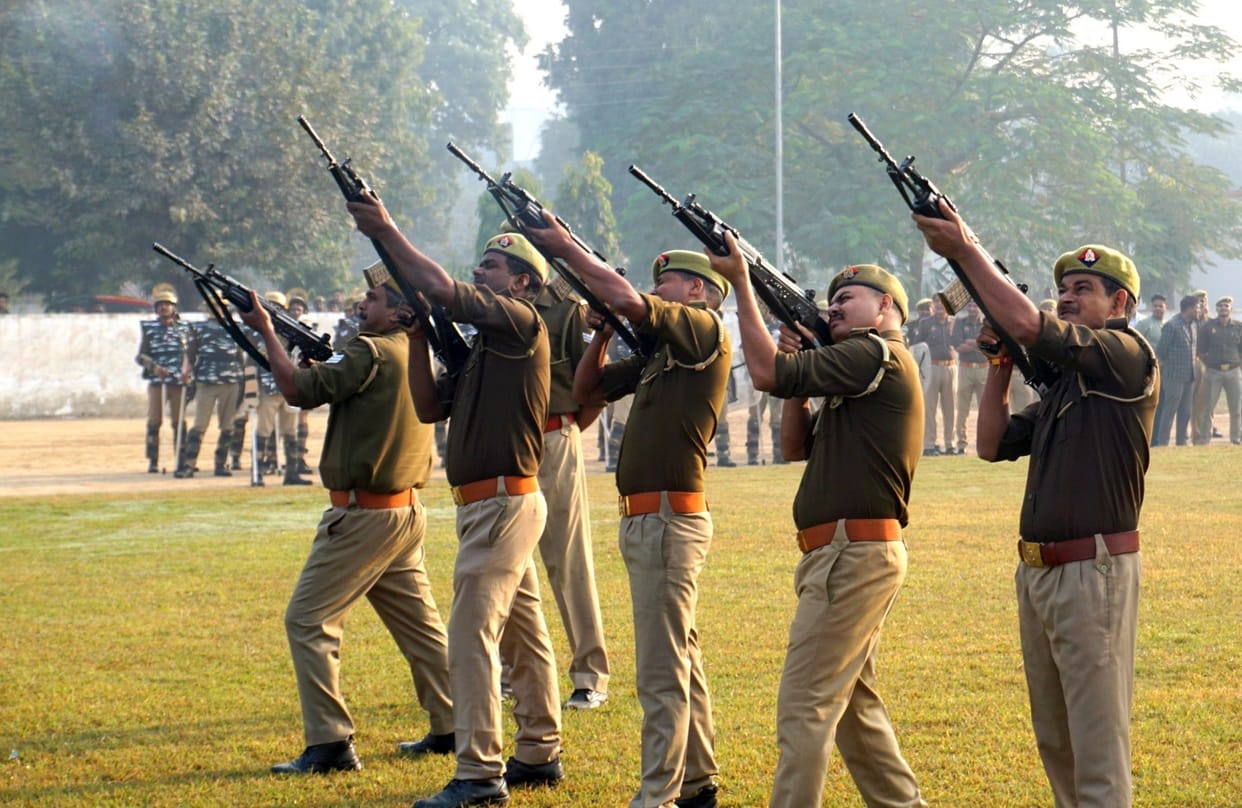 The police line echoed with the sound of bullets.