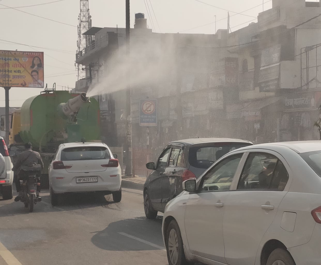 Water sprinkling done in the city to reduce the effect of pollution