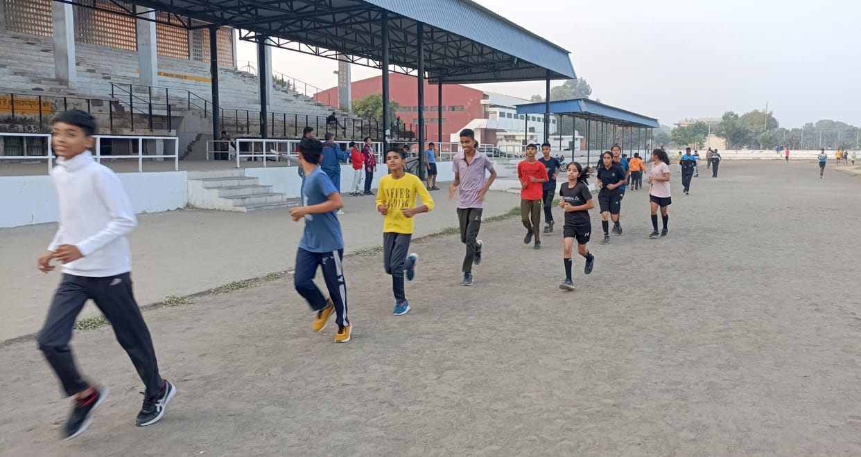 Players who are giving flight to their dreams by running on a dilapidated track