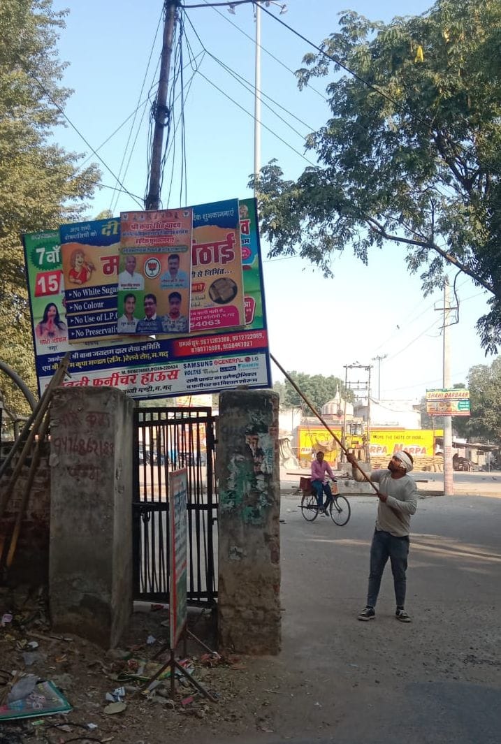 Municipality employees removed hoardings from pillars