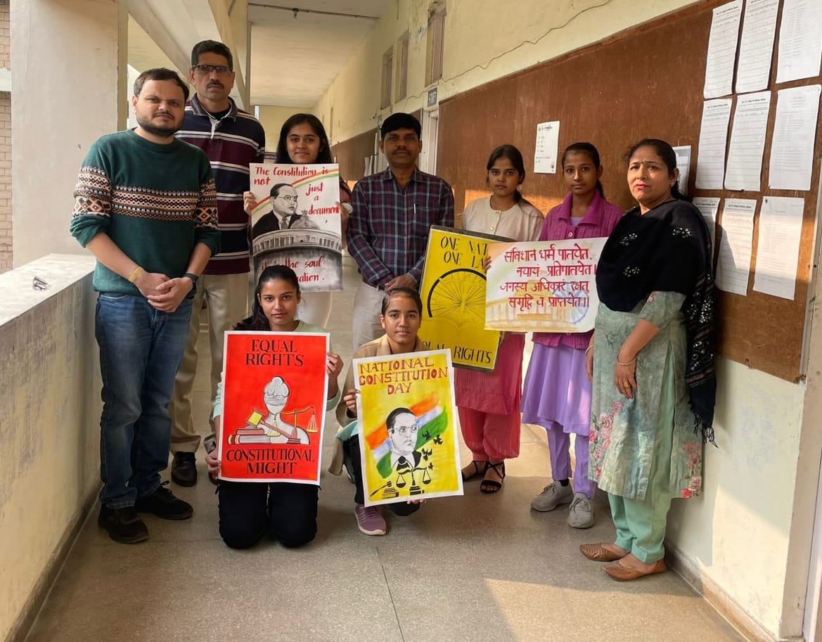 Srishti got first place in poster making, Priyanka got first place in slogan.