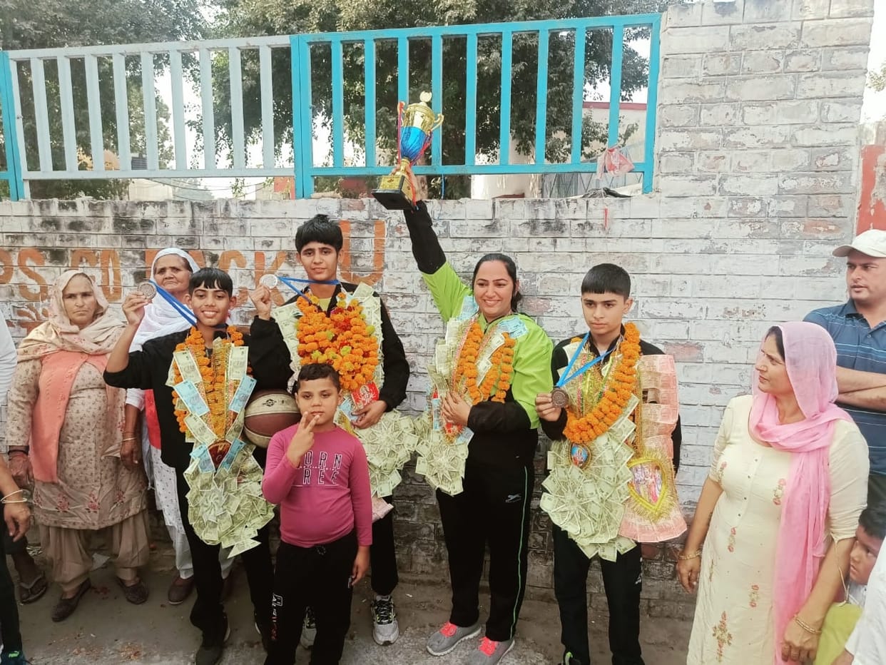 Sneha was welcomed after returning from the national basketball competition after winning silver