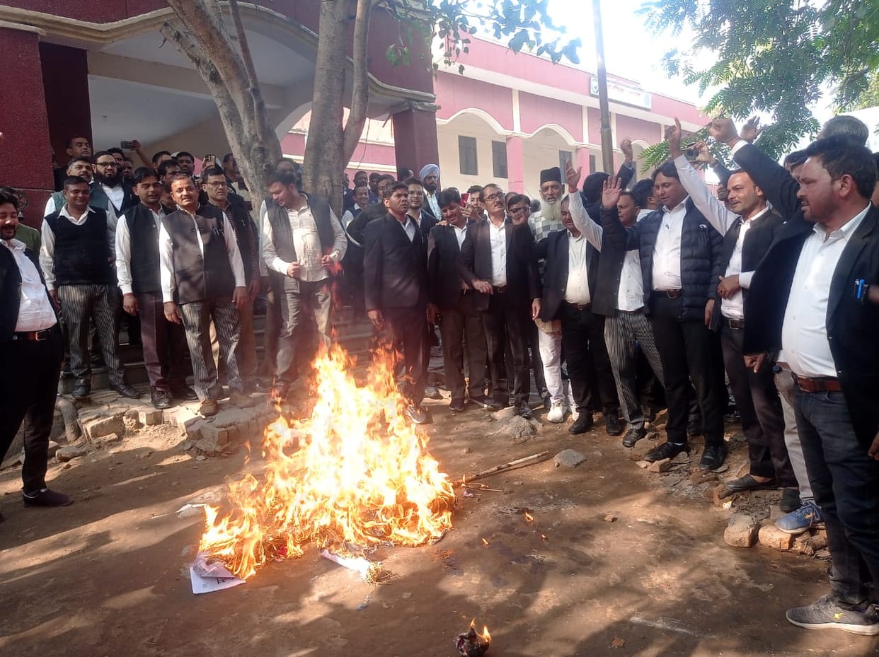 Protested by burning an effigy in front of the Sub Registrar office