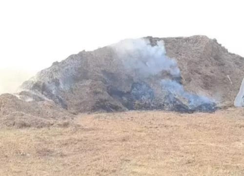 People are troubled by the fire in the stubble heap in village Kharkhari for five days.