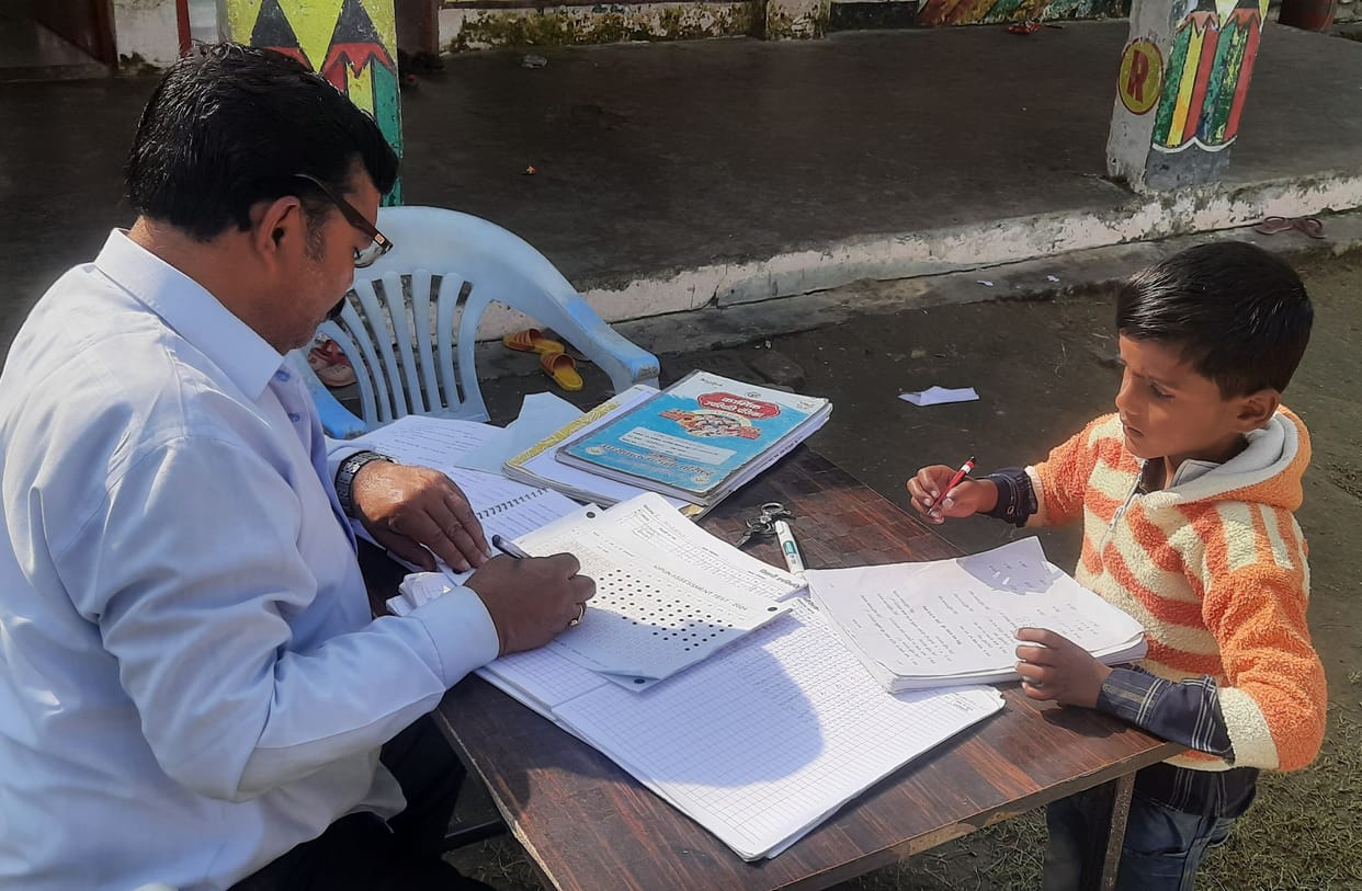 Children told the answers, Guruji filled the OMR sheet.