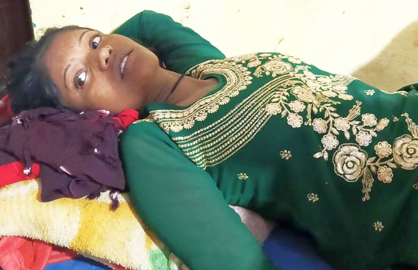 While digging soil in a pond, three girls fell down
