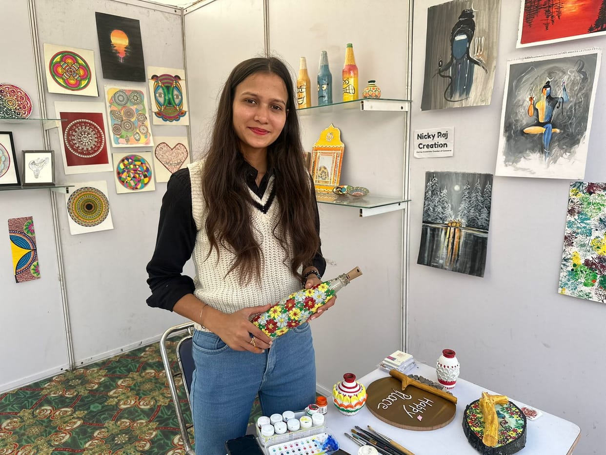 Nandini's wall painting and model are pleasing to the tourists