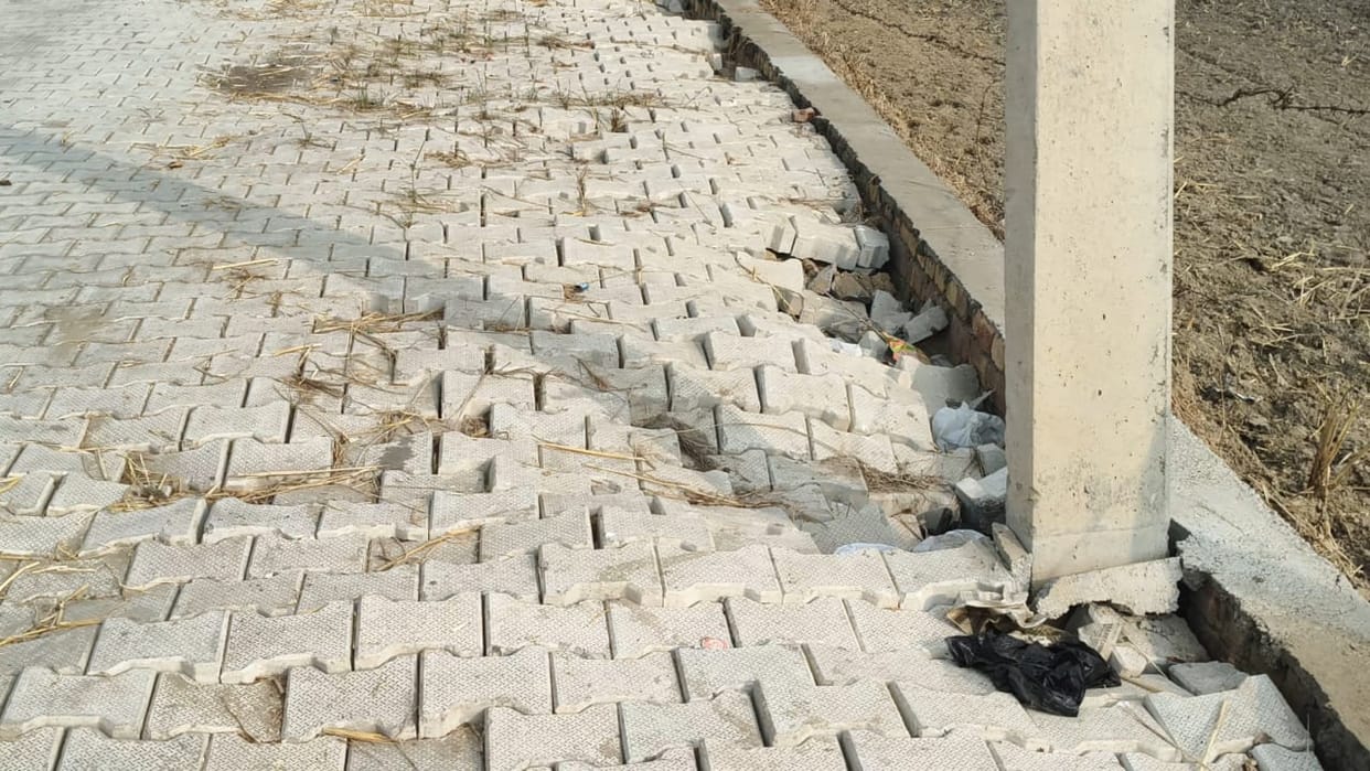 Interlocking road built three months ago started sinking in Damdama, villagers angry, accused of poor construction work