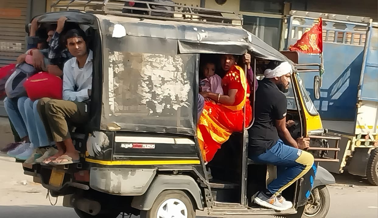 10 year old diesel auto running on the roads, following rule 3, carrying 14 passengers